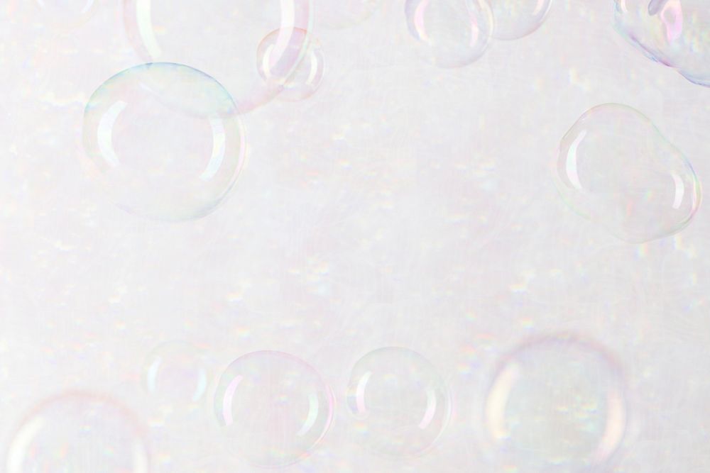Transparent soap bubble pattern on a gray wallpaper background 