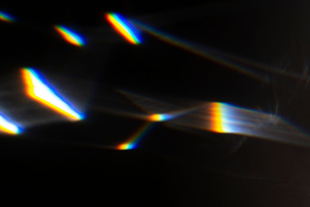 Light leak effect on a black background wallpaper