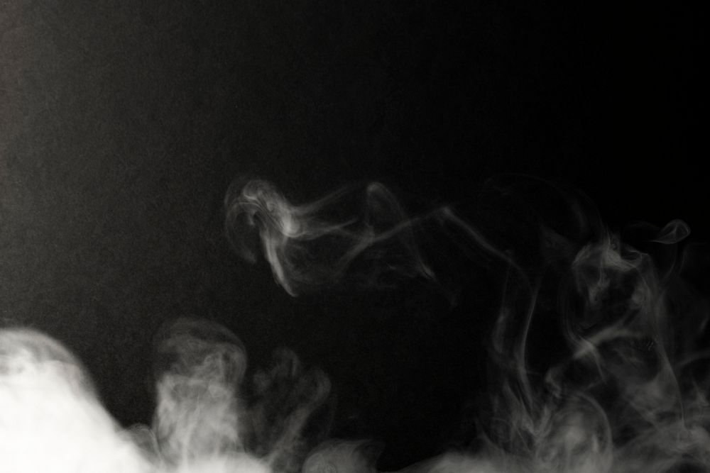 White smoke effect on a black background wallpaper
