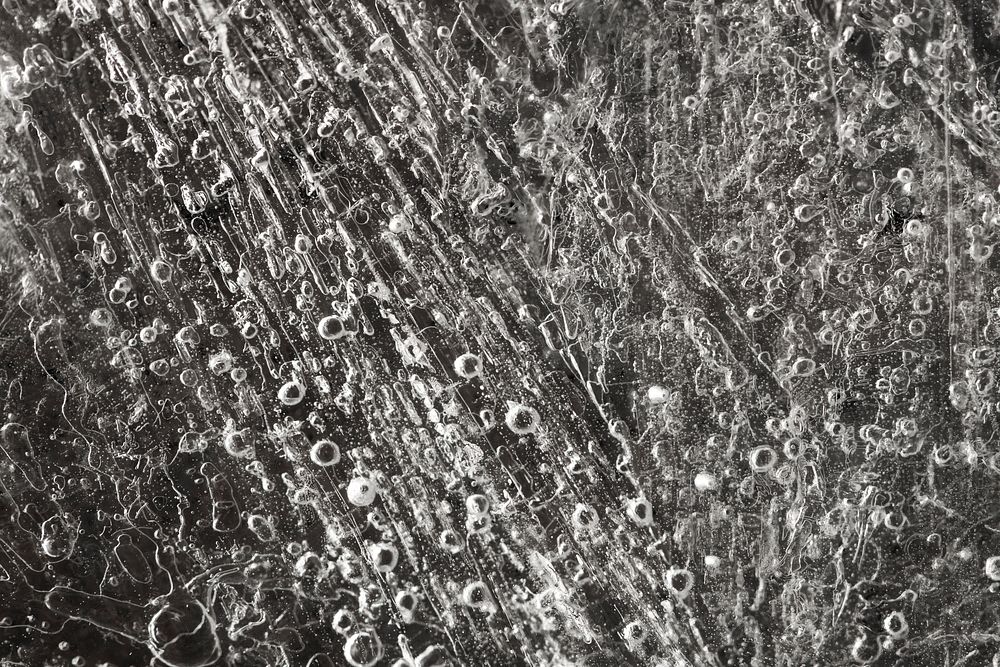 Ice surface texture macro shot on a dark background wallpaper