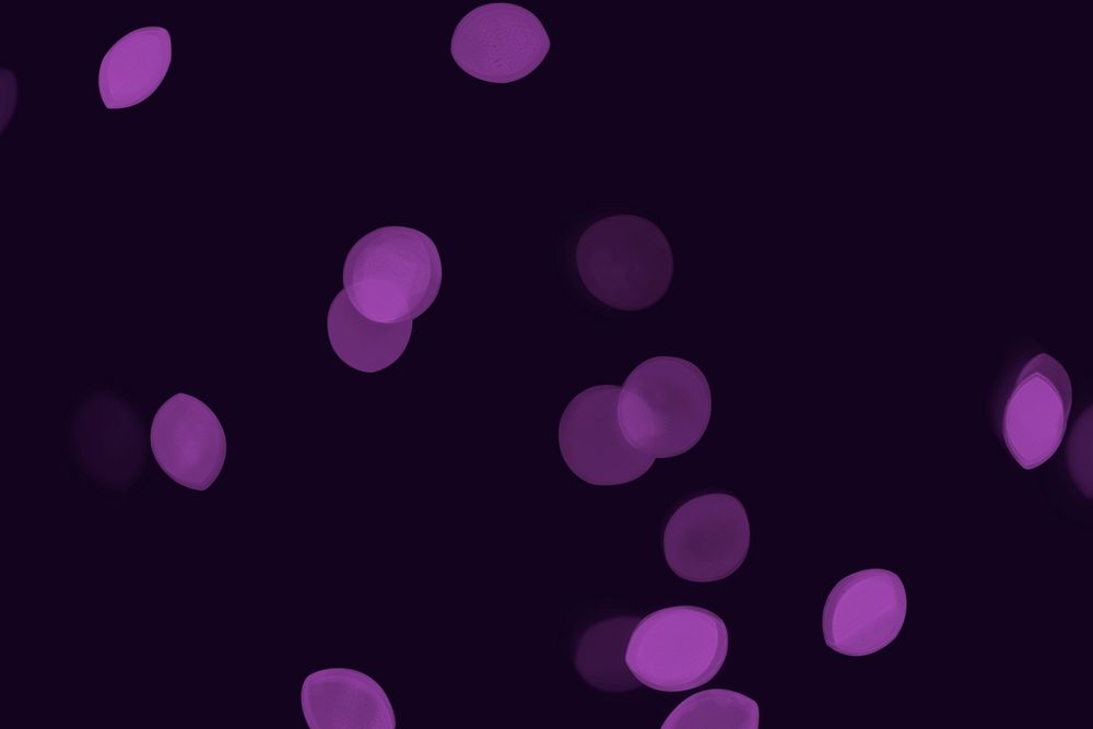 Purple bokeh pattern design element on a dark background