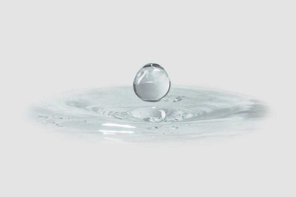 Water splash design element on a gray background