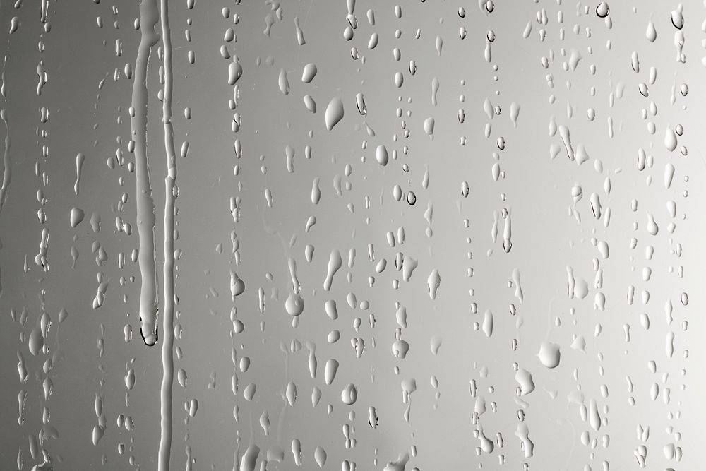 Water drops on a gray background wallpaper