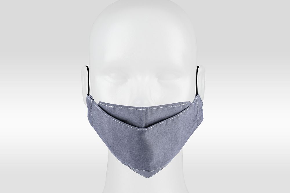 Gray fabric face mask on a dummy head
