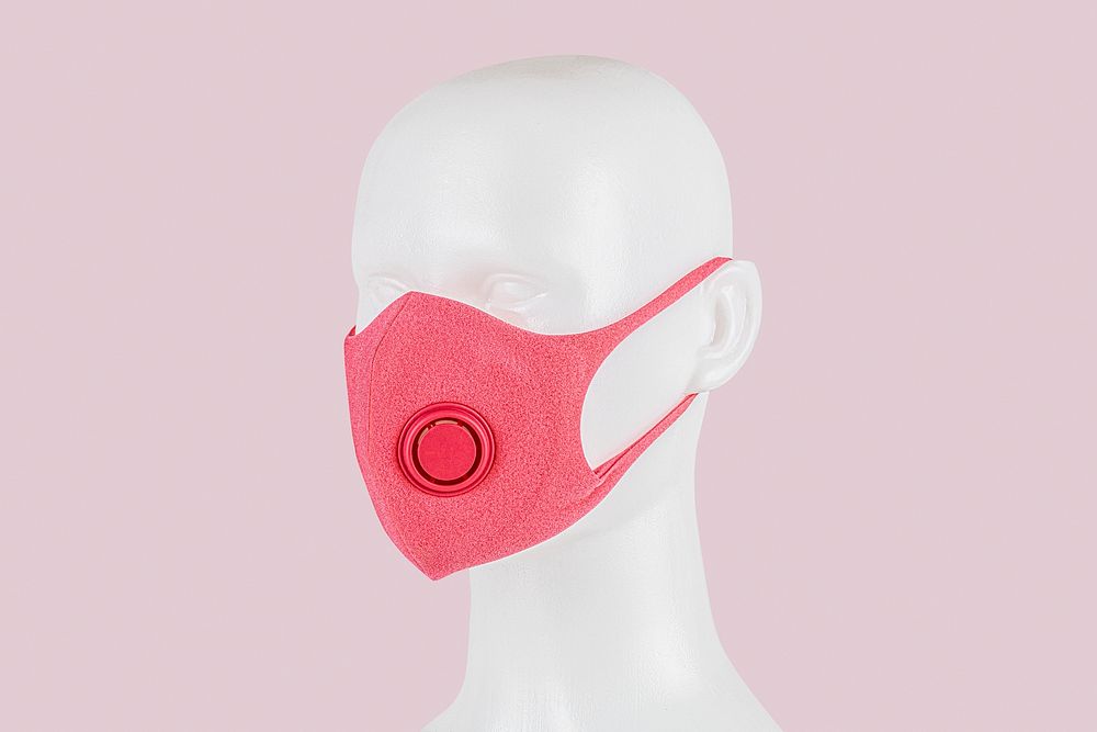 Pink foam mask with valve on a white mannequin head