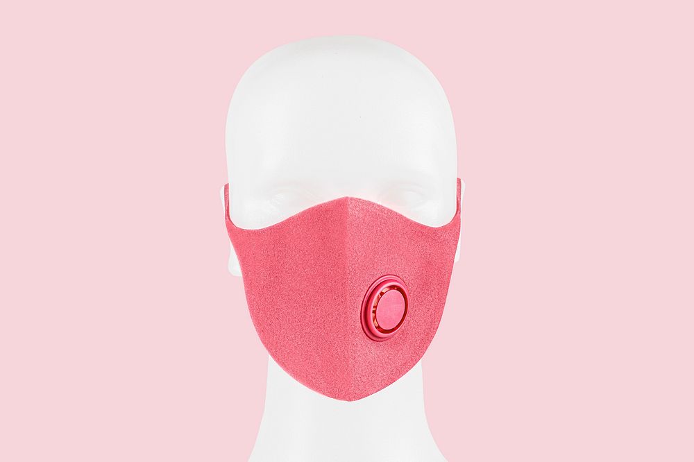 Pink foam mask with valve on a white mannequin head