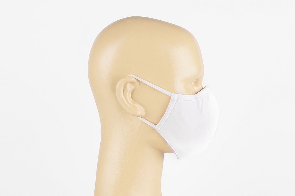 White fabric face mask on a mannequin