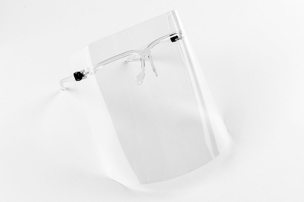 Eyewear with detachable face shield on a gray background
