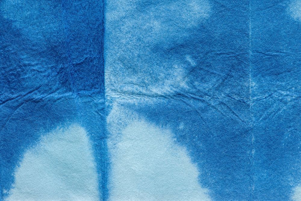 Indigo shibori textured blue background