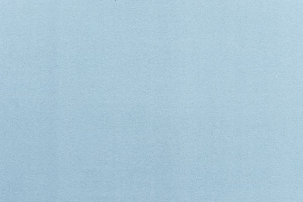 Light blue paper textured background