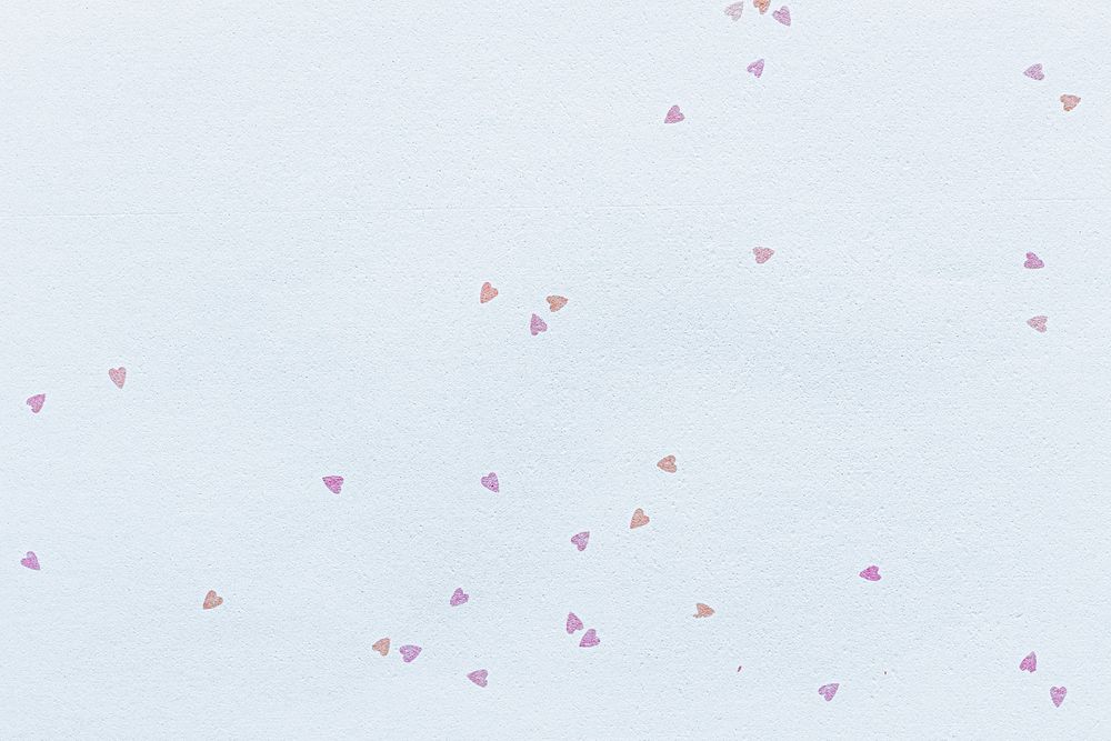 White paper decorated with small hearts textured background