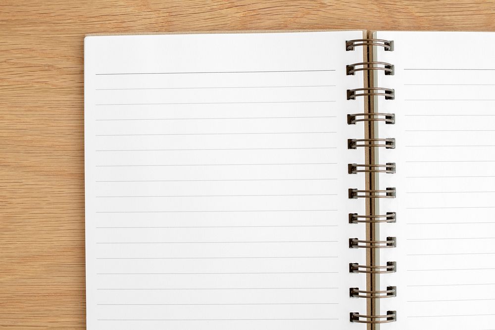 Blank lined notebook on a wooden table
