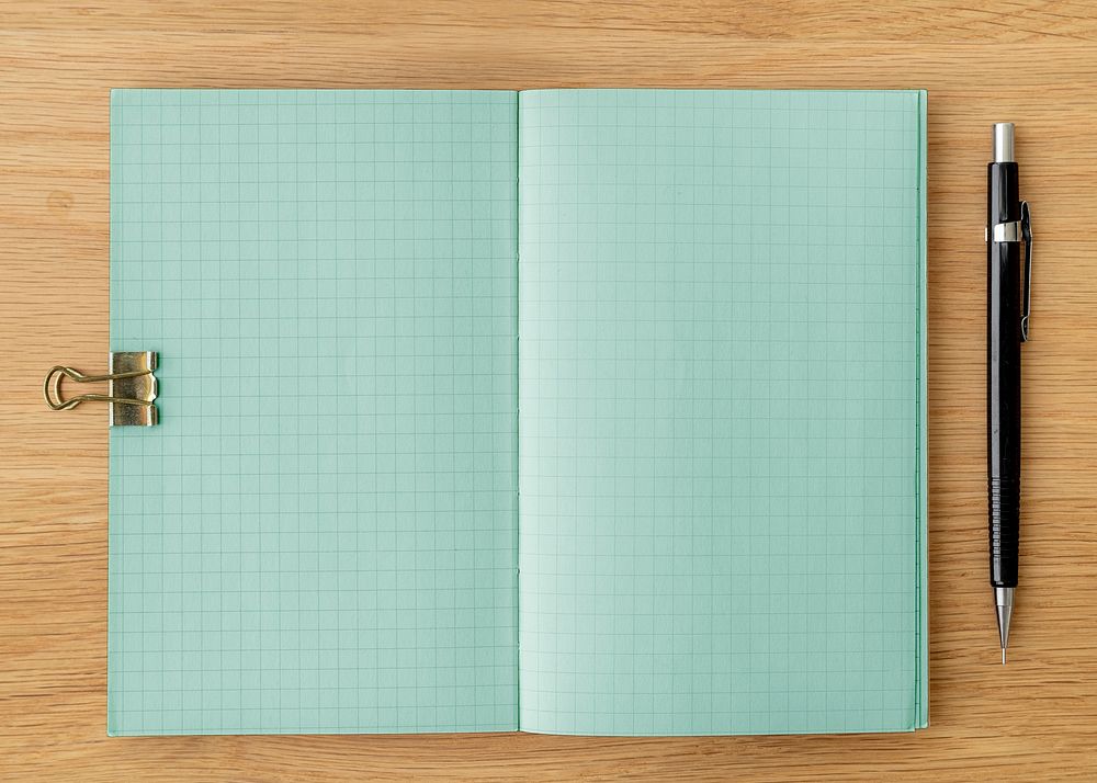 Blank plain notebook page with stationary mockup