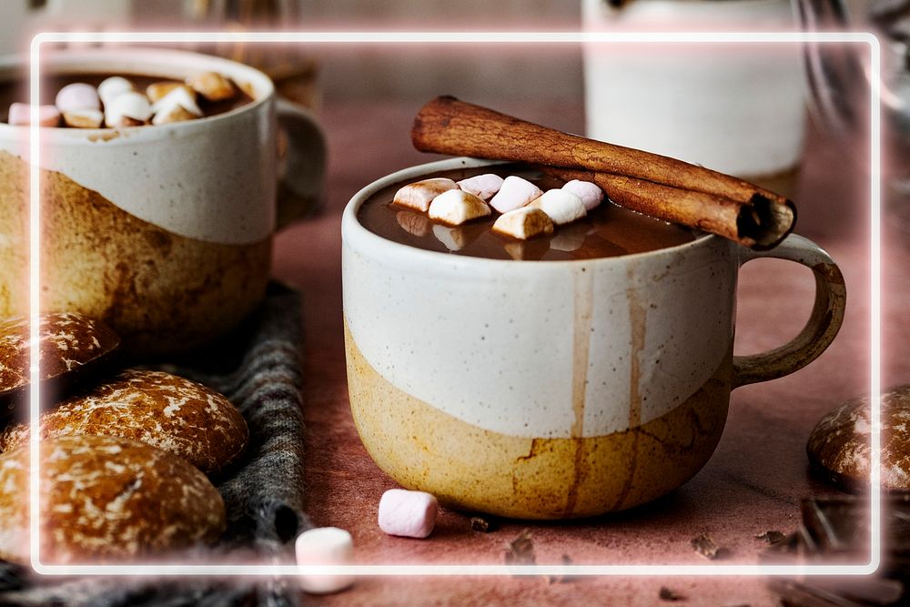 Neon frame psd with warming hot chocolate with marshmallows in winter