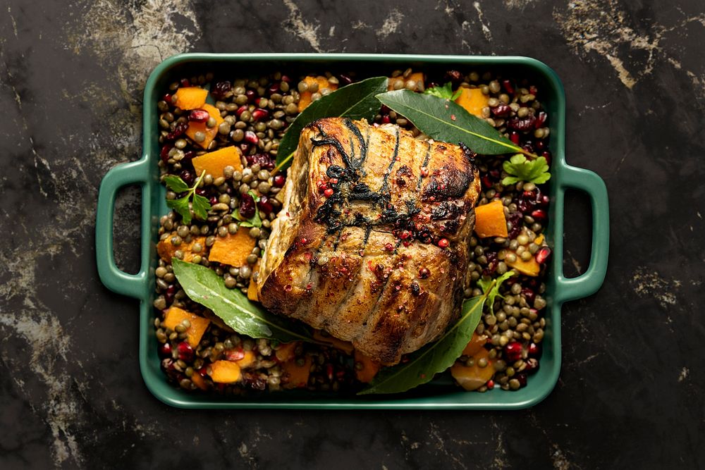 Roasted Christmas ham table mockup with pomegranate and lentils psd food photography