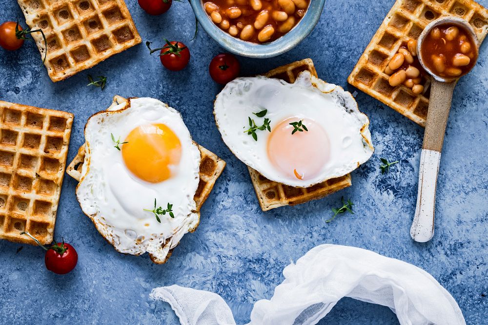 Holiday breakfast with egg on waffle food photography