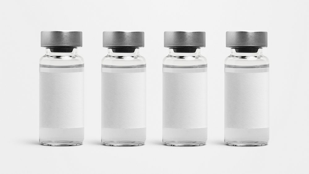 Four injection vial bottles with psd label mockups