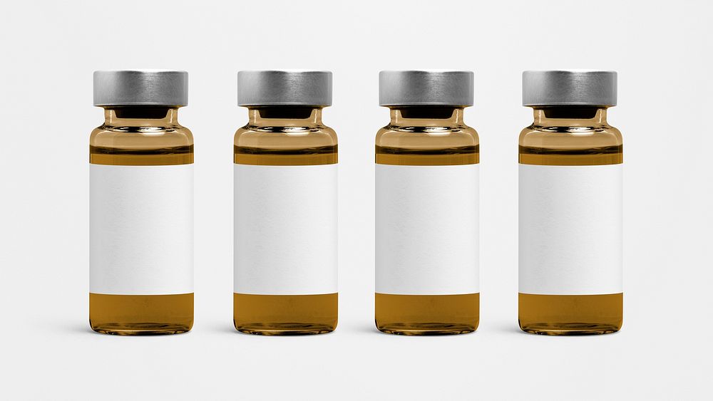 Four brown injection vial bottles with psd label mockups