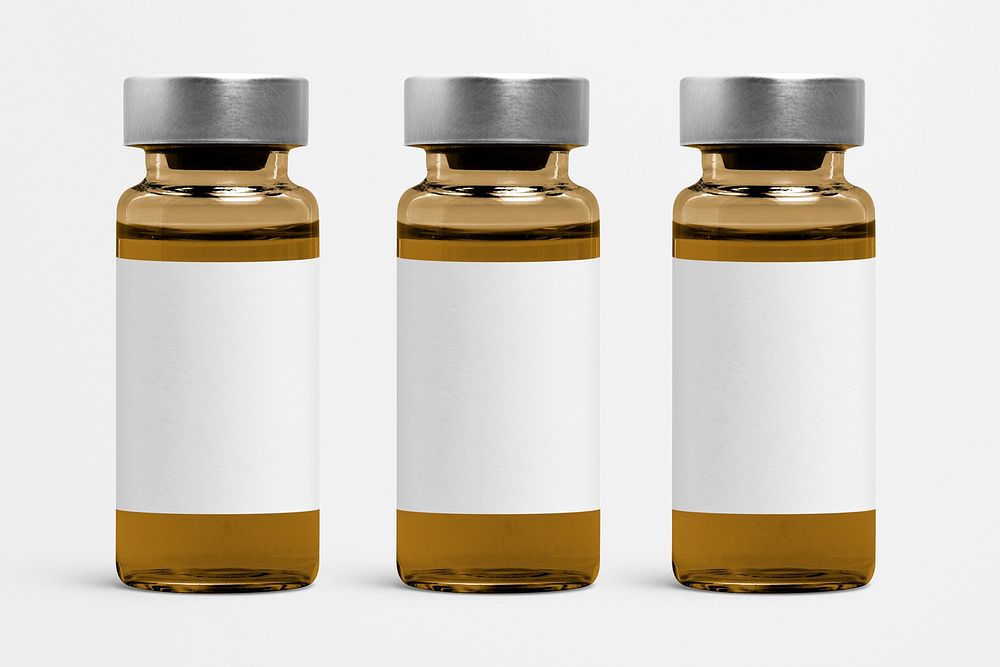 Three amber injection vial bottles with psd label mockups