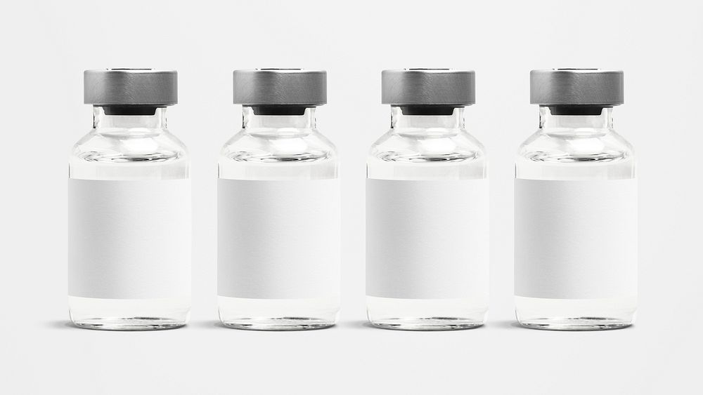 Four injection vial bottles with psd label mockups