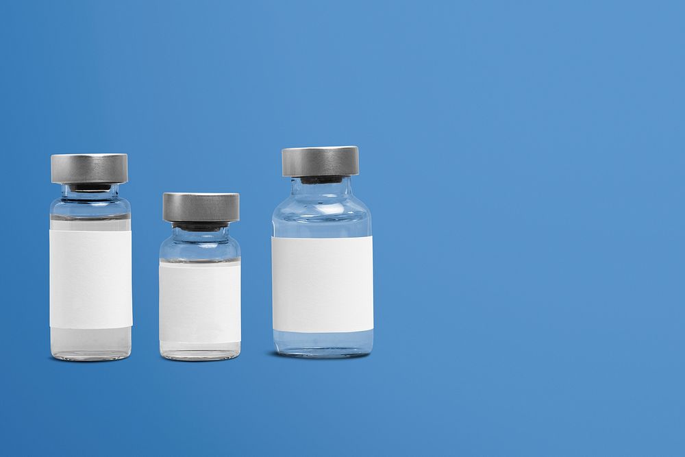 Three injection vial bottles with psd label mockups