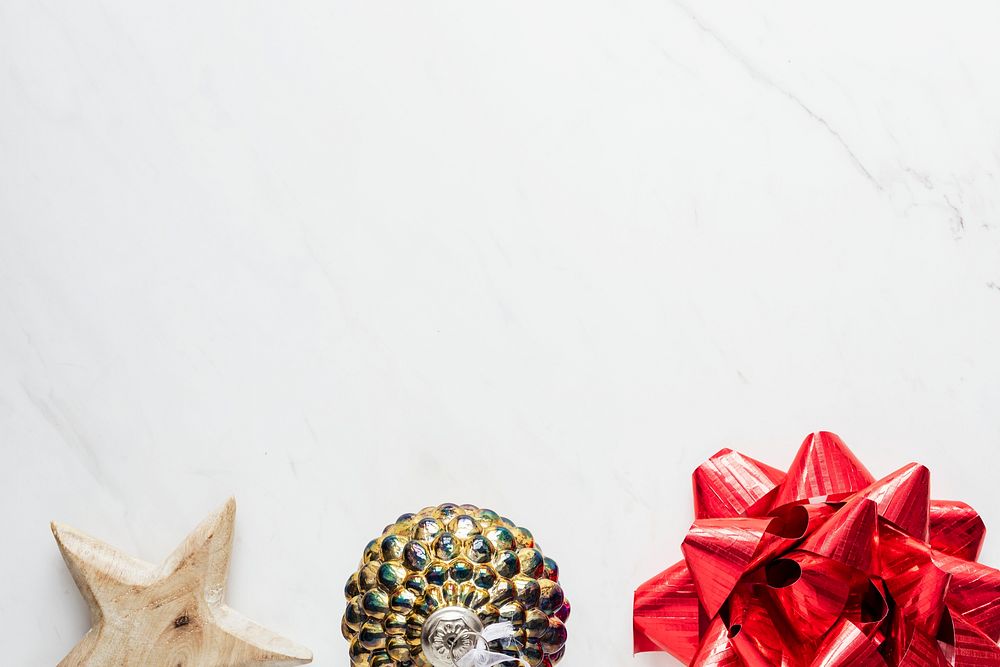 Christmas red ribbon on a marble background