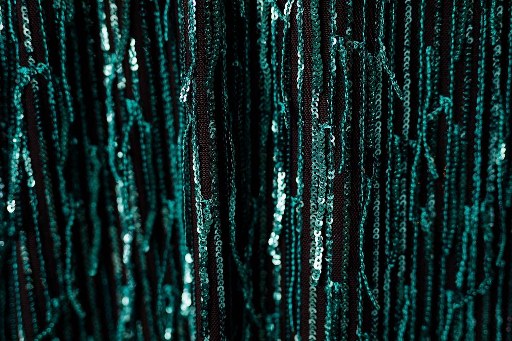 Fabric with shiny green sequins 