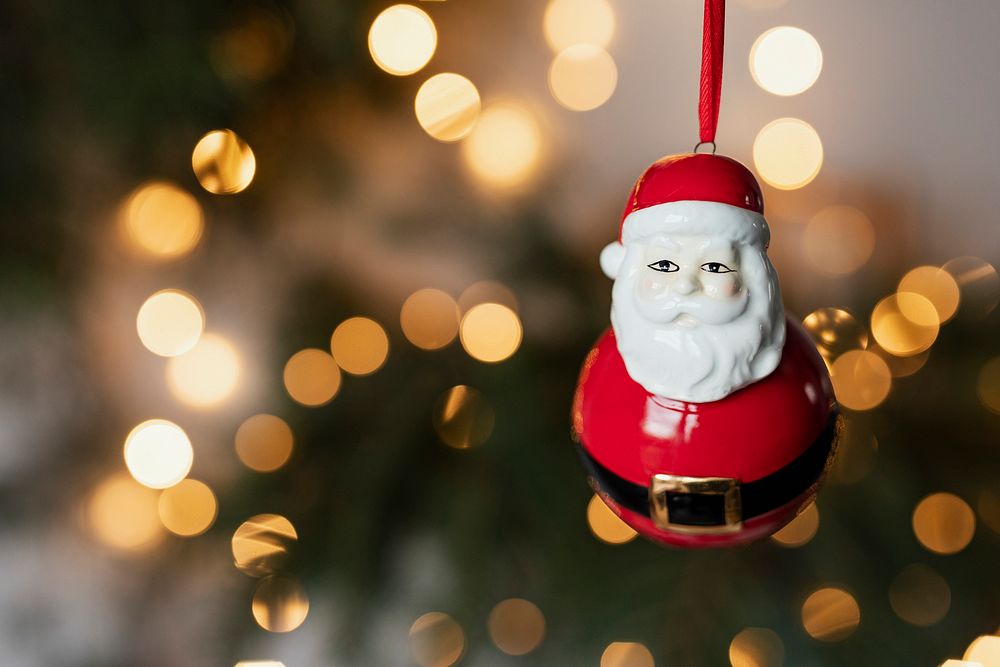 Santa Claus ornament hanging on the tree
