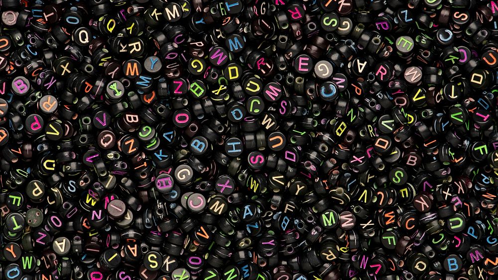 Black English alphabet beads banner background