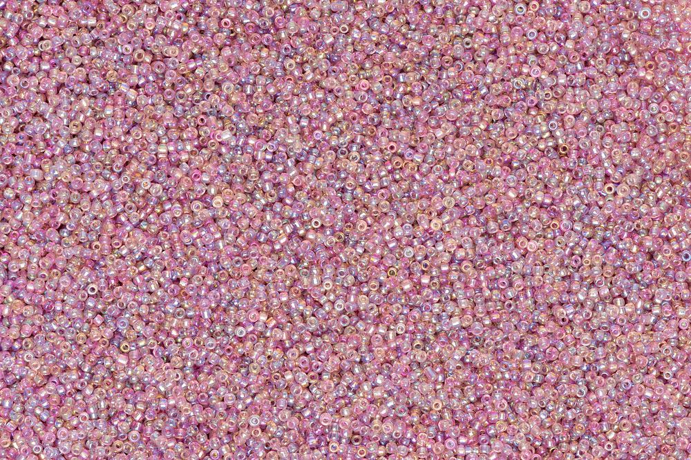 Pink pastel holographic beads background