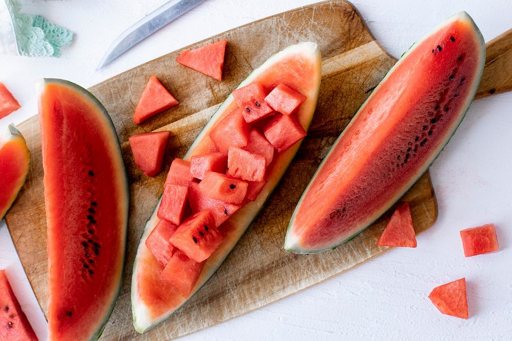 Sliced watermelon on a white table