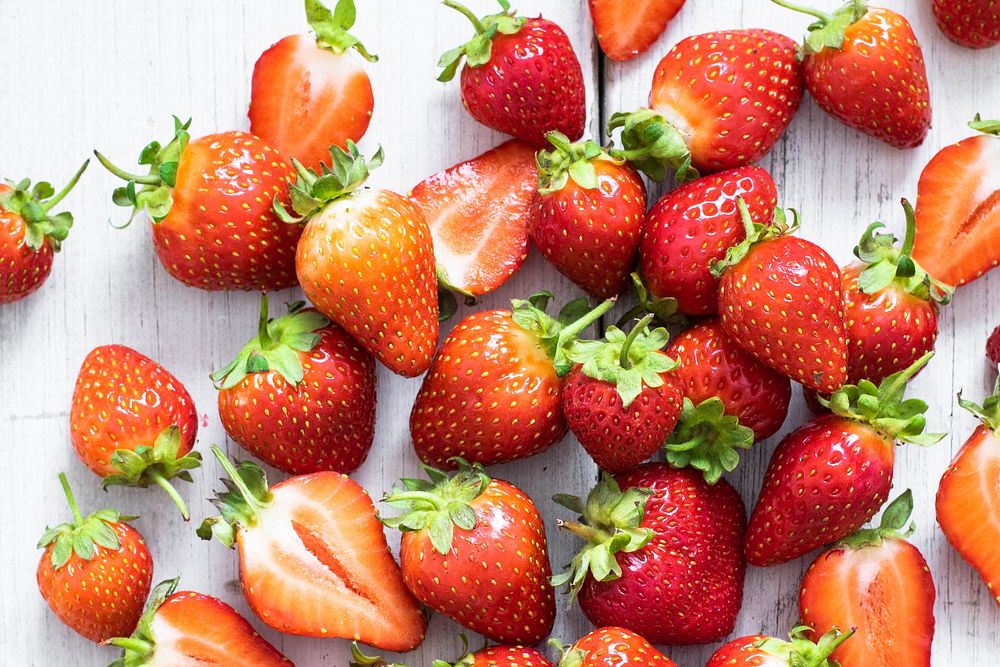 Strawberry on white wooden table top view