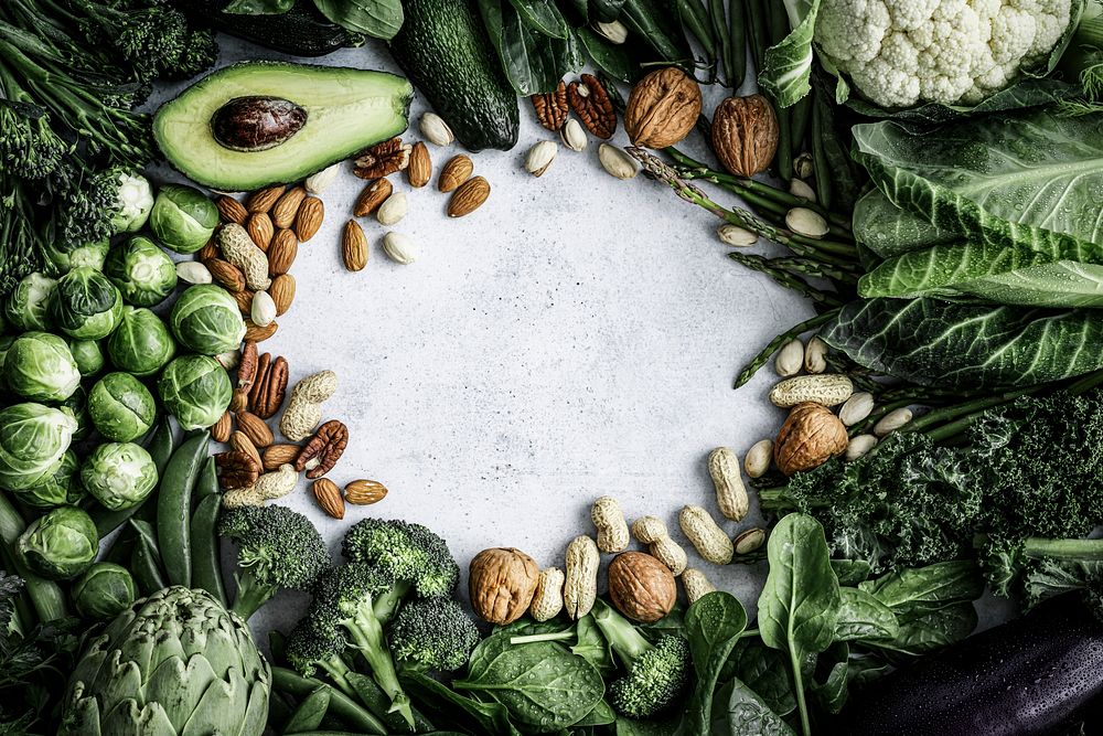 Green vegetable frame with nuts and avocado