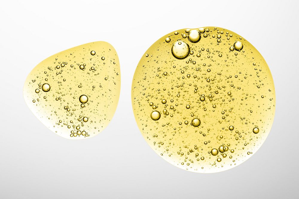 Yellow oil liquid bubble macro psd cosmetic product