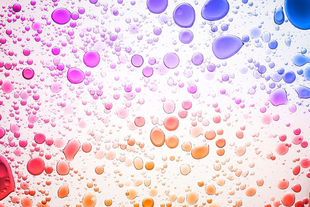 Abstract background colorful oil bubble in water wallpaper