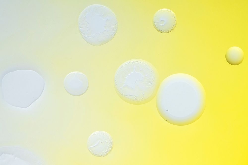 Yellow background abstract oil bubble texture
