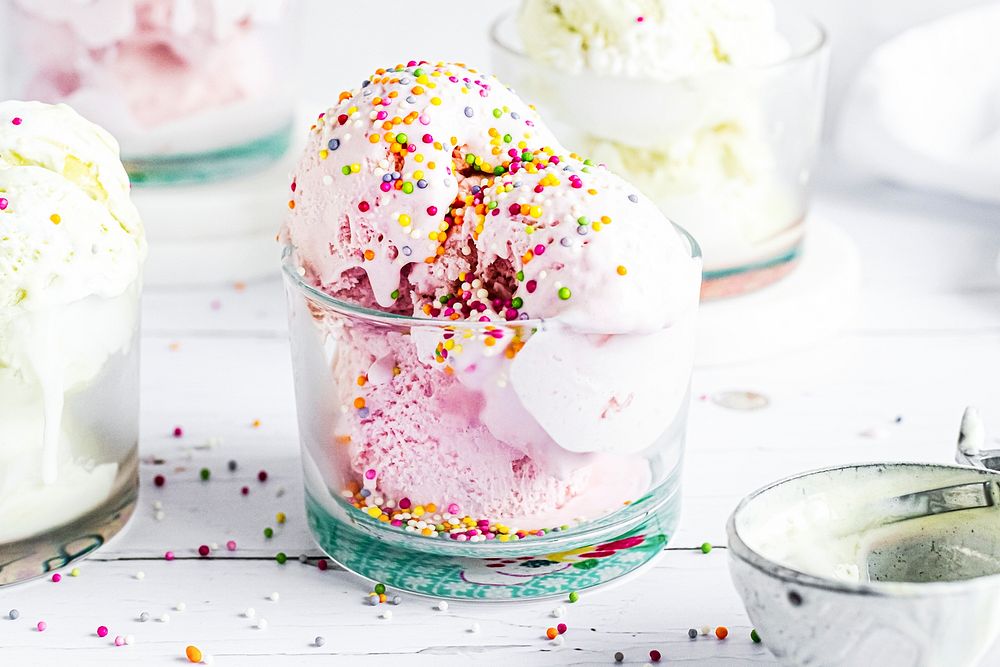 Dessert party with strawberry ice cream topped with funfetti sprinkles