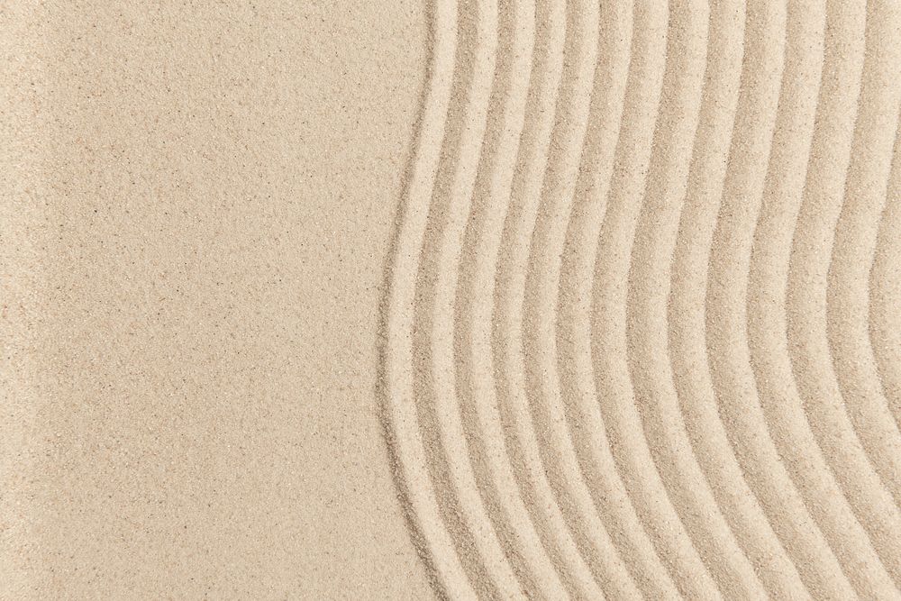 Zen sand wave textured background in health and wellness concept