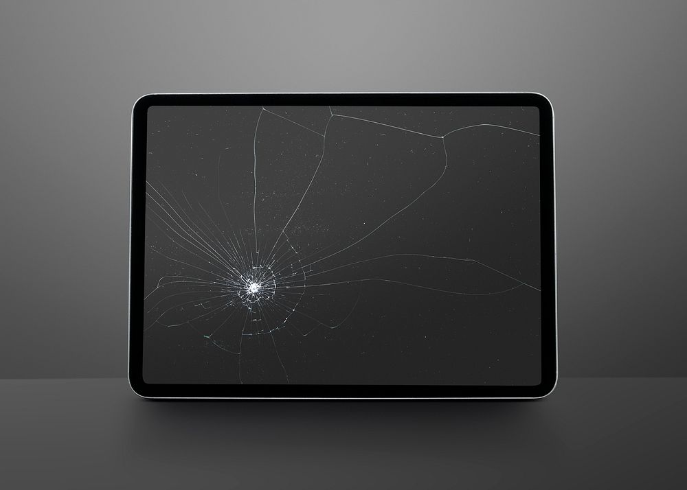 Broken tablet screen mockup psd with cracked glass