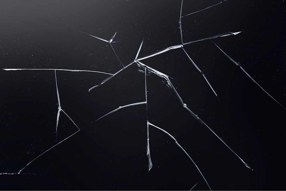 Black background with cracked glass texture