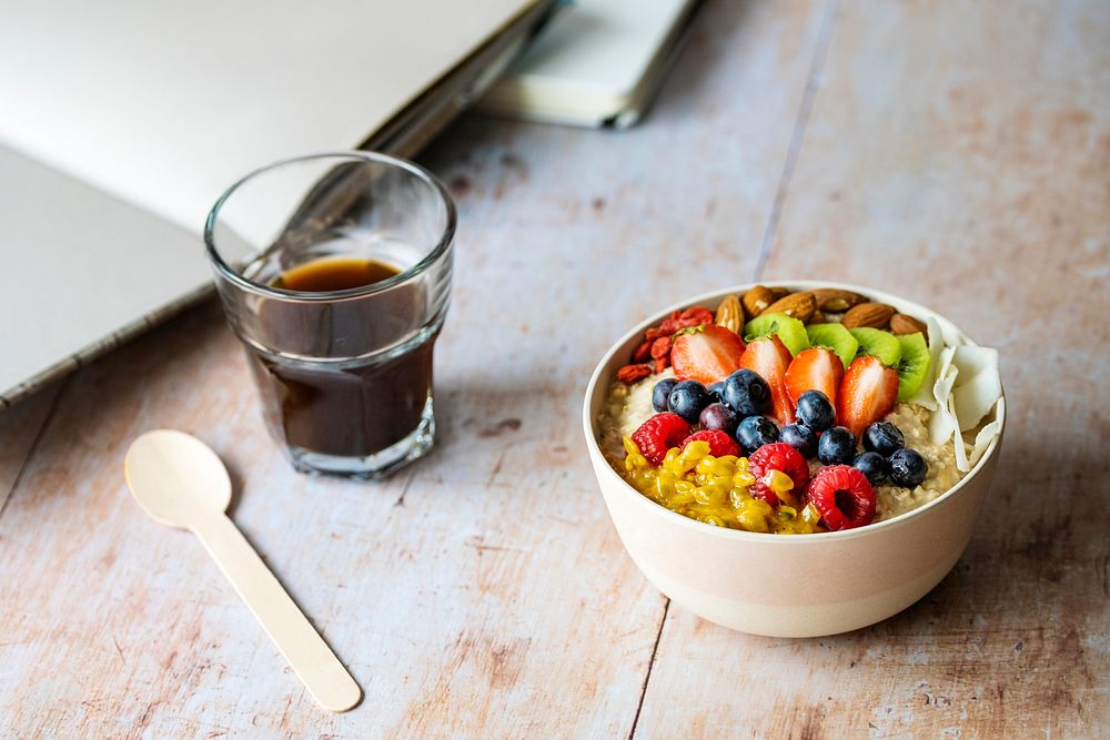 Superfoods breakfast on wooden table Premium Photo rawpixel