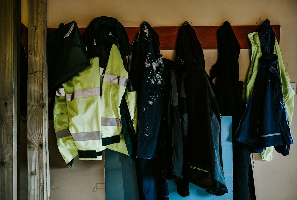 Workwear coats and jackets hanging on a rack