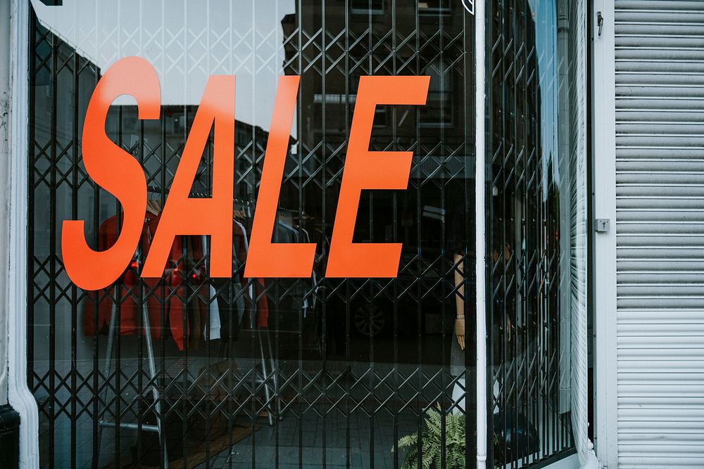 Store window display with a text sale