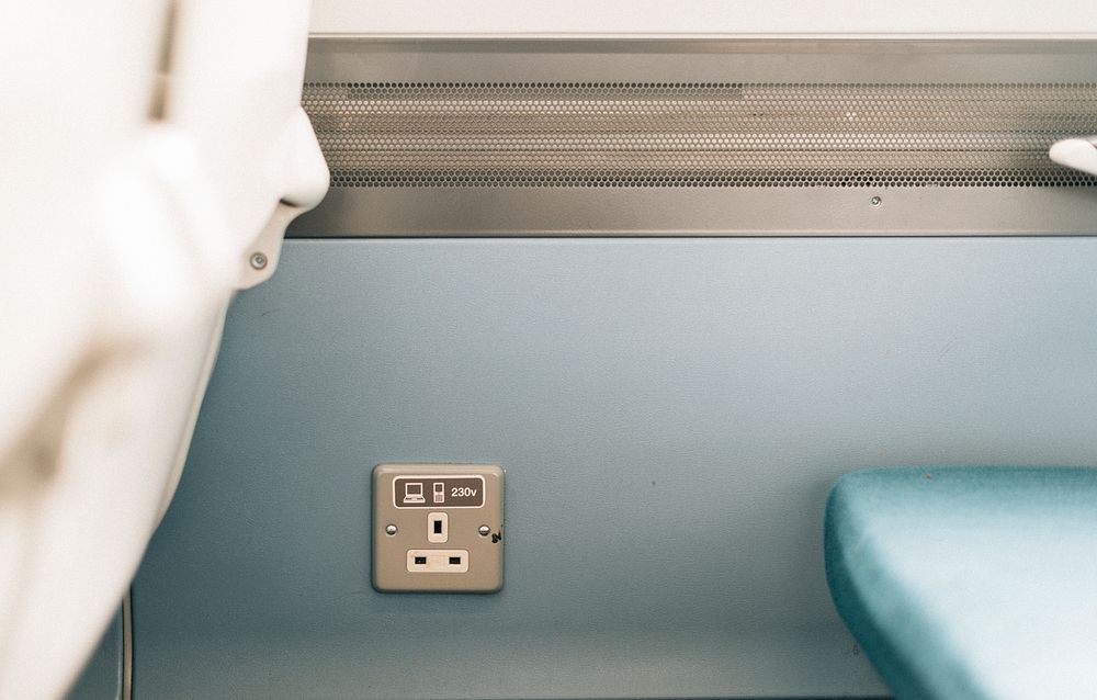 Electric supply socket in a train