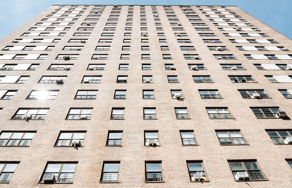 Exterior of a tall apartment in a city