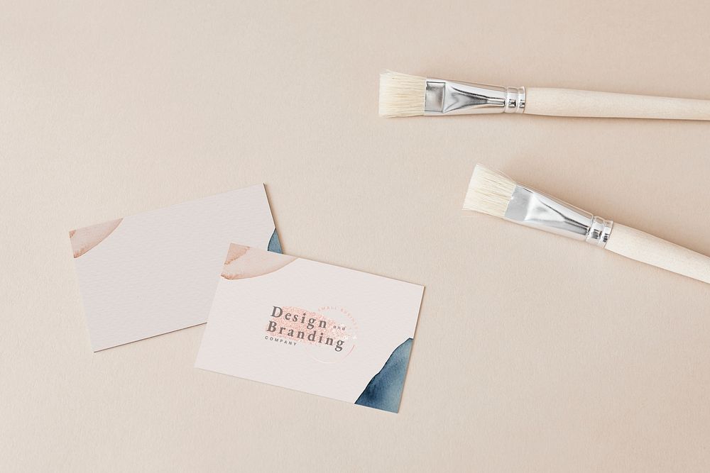 Design branding company card and paintbrushes mockup