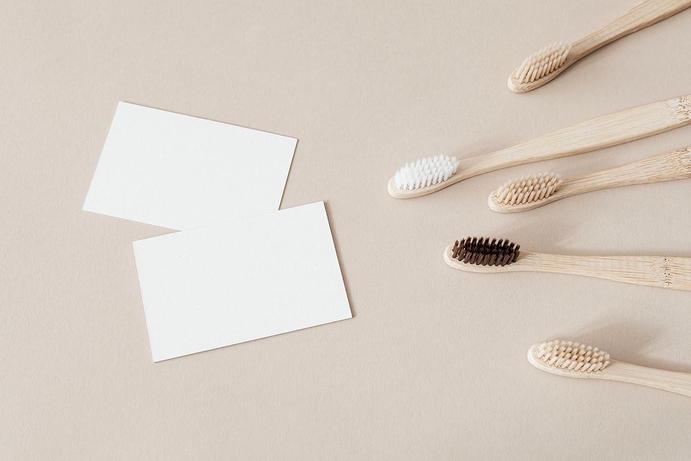 Bamboo toothbrushes and white blank cards