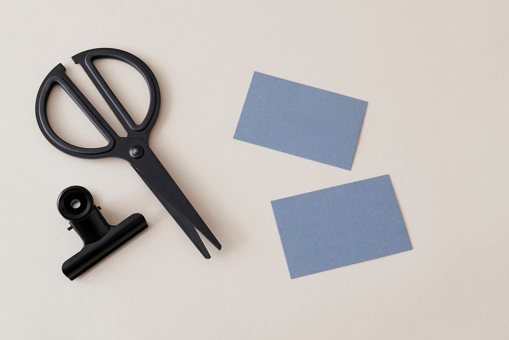 Blank personal card and black scissors mockup