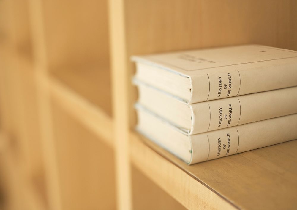 Free books on a wooden shelves photo, public domain CC0 image.