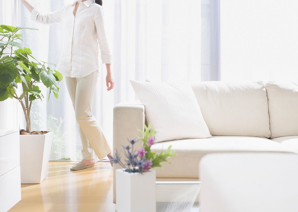 Free woman in white living room image, public domain people CC0 photo.